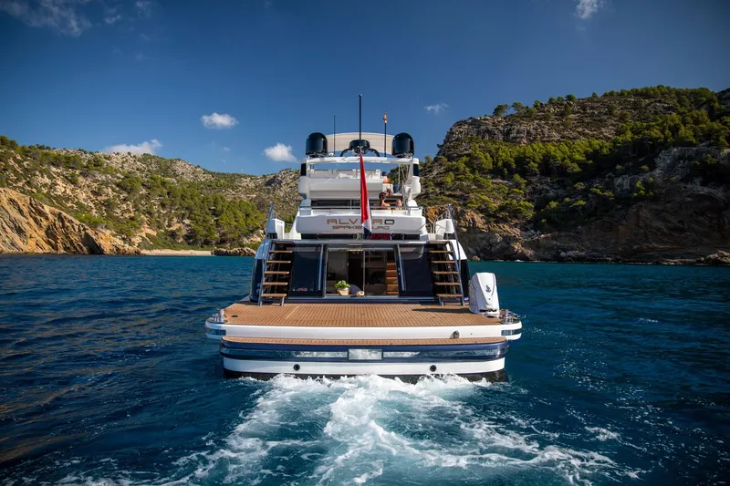 Slide: The Image of Van der Valk BeachClub 660 Flybridge 2025 yacht cruising in a scenic bay. - 6