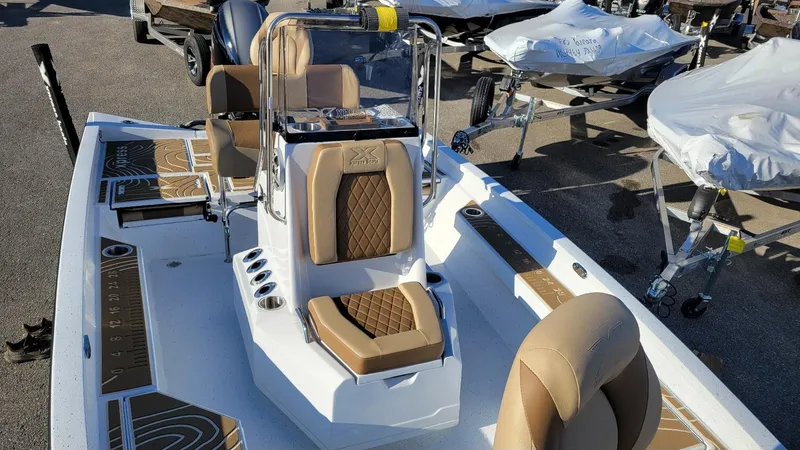 Slide: The Image of 2025 Xpress H20 Bay boat with Yamaha Vmax 150, tan seats, in stock. - 7