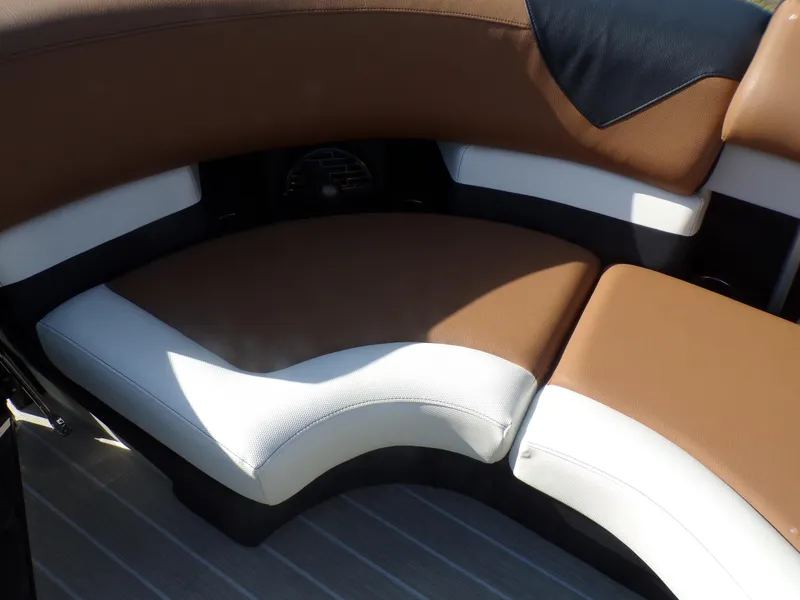 Slide: The Image of 2024 Trifecta 23 RF SS With Arch boat interior seating, brown and white upholstery. - 11