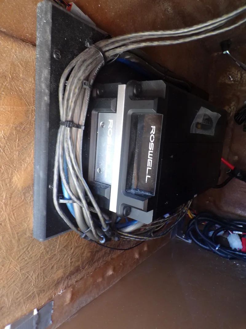 Slide: The Image of 2024 Trifecta 23 RF SS With Arch boat wiring and Roswell audio equipment. - 16