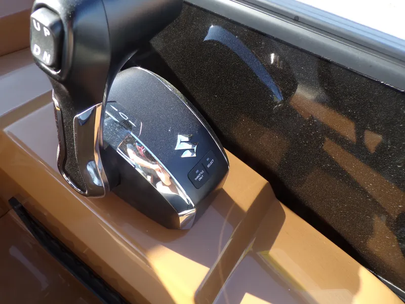 Slide: The Image of Close-up of the 2024 Trifecta 23 RF SS With Arch throttle control. - 17