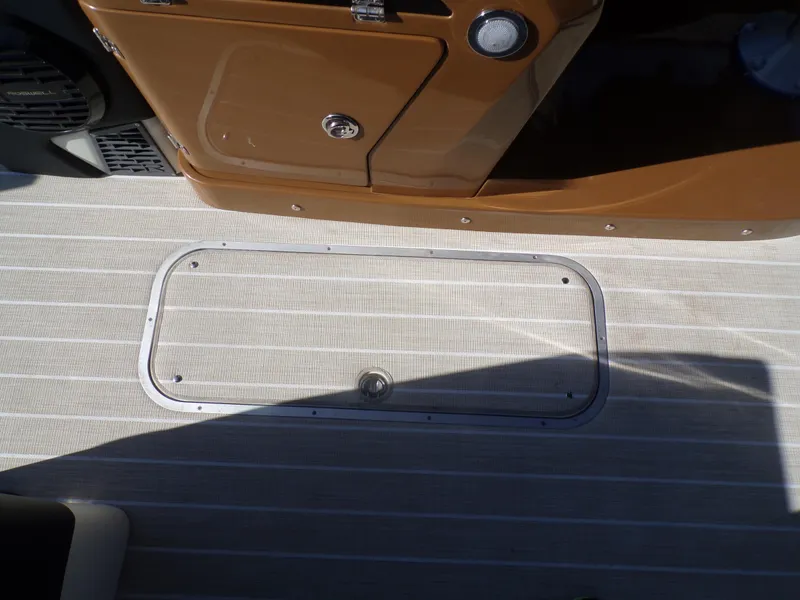 Slide: The Image of 2024 Trifecta 23 RF SS With Arch boat deck and storage compartment. - 20