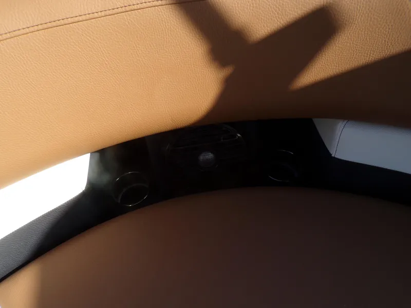 Slide: The Image of 2024 Trifecta 23 RF SS With Arch, tan leather seating detail. - 23