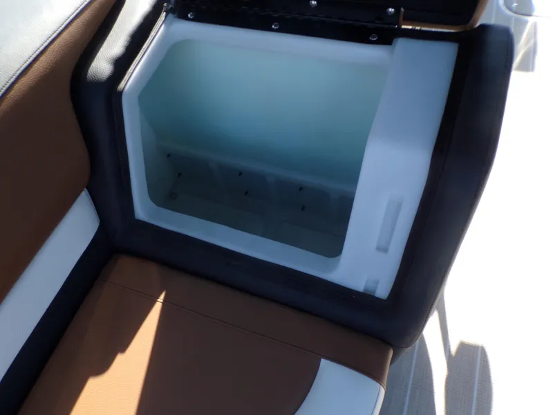 Slide: The Image of Built-in storage compartment on the 2024 Trifecta 23 RF SS With Arch boat. - 25
