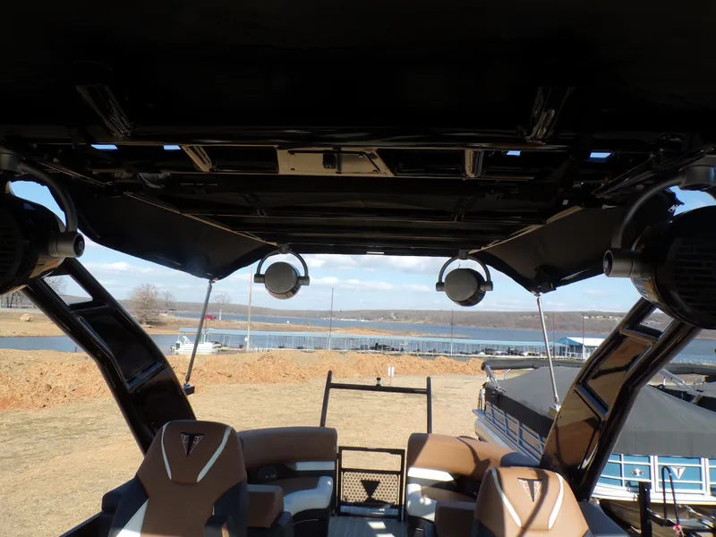 Slide: The Image of 2024 Trifecta 23 RF SS With Arch, interior view, overlooking a lake and docks. - 30