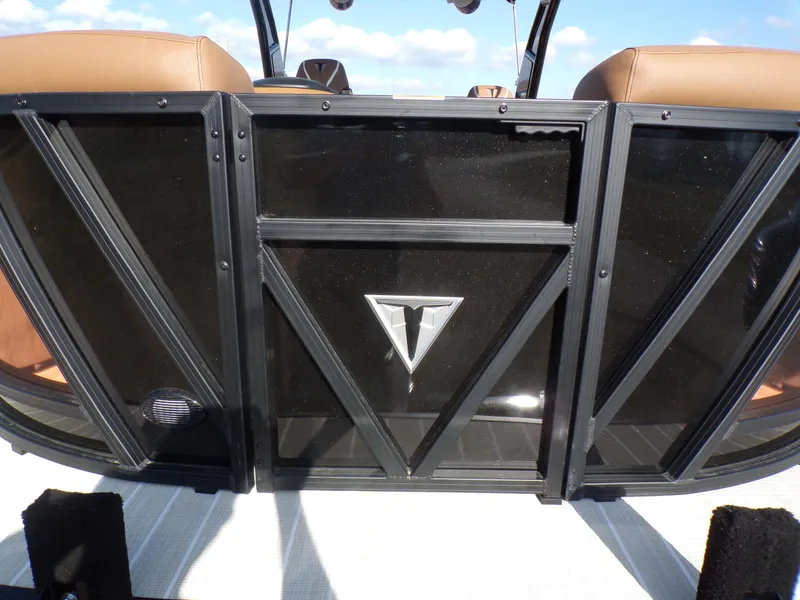 Slide: The Image of 2024 Trifecta 23 RF SS With Arch, rear view of boat seating and logo. - 32