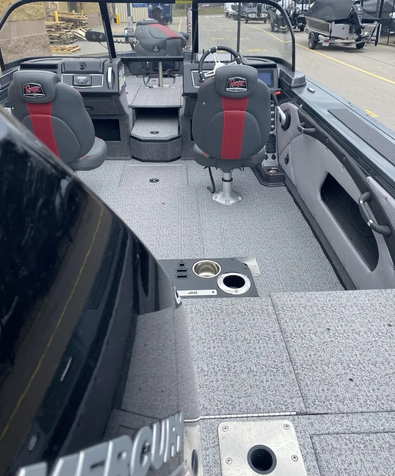 Slide: The Image of 2024 Ranger VX1988 WT boat interior with seating and steering console. - 4