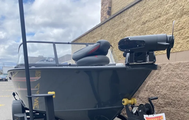 Slide: The Image of 2024 Ranger VX1988 WT boat parked outdoors, featuring sleek design and modern equipment. - 5