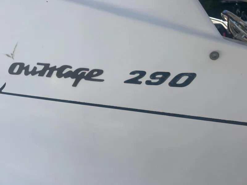 Slide: The Image of 2003 Boston Whaler 290 Outrage boat model nameplate - 20