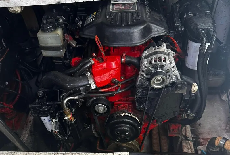 Slide: The Image of 2006 Four Winns 328 Vista engine compartment with visible components. - 13