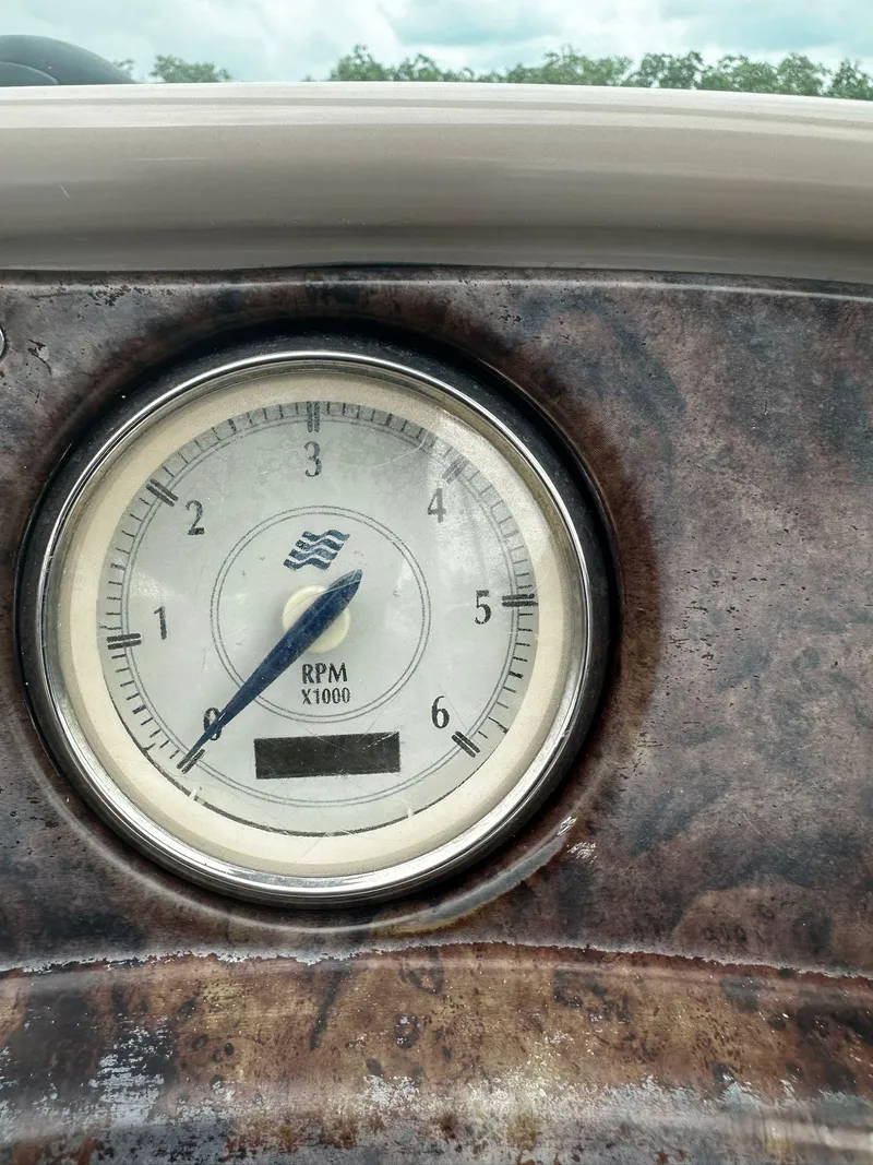 Slide: The Image of 2006 Four Winns 328 Vista RPM gauge on dashboard - 16