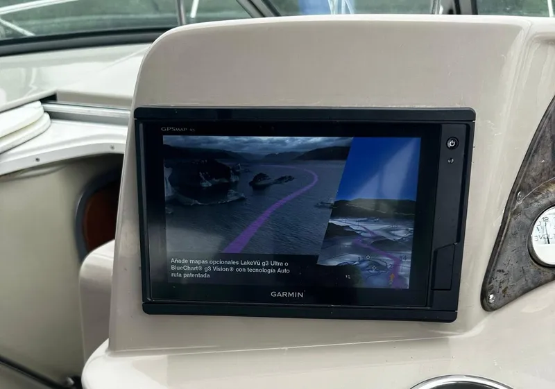 Slide: The Image of Garmin GPS navigation system on a 2006 Four Winns 328 Vista boat. - 21