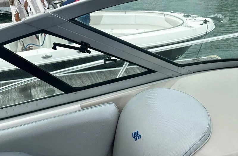 Slide: The Image of Interior view of 2006 Four Winns 328 Vista boat with docked boat in background. - 25