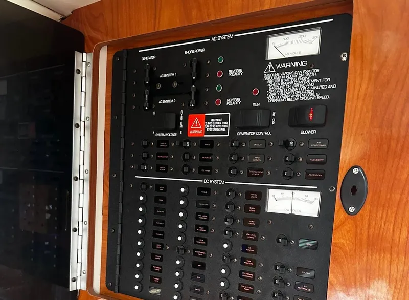 Slide: The Image of Electrical control panel of a 2006 Four Winns 328 Vista boat. - 31