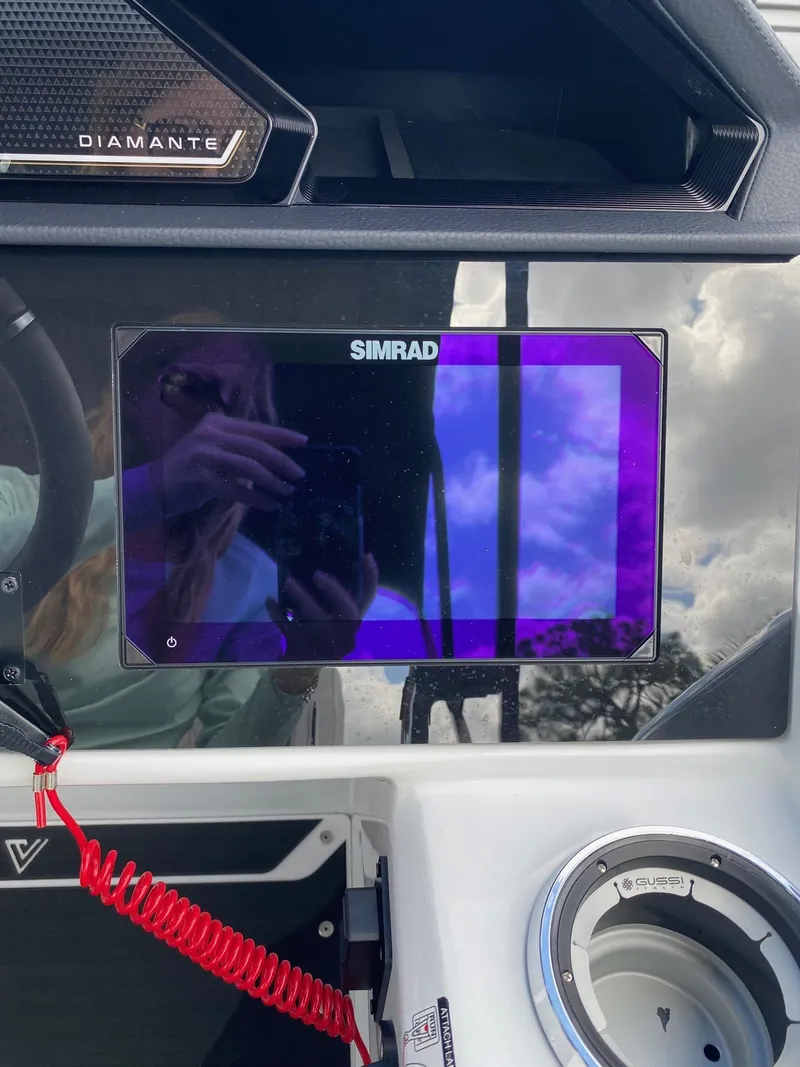 Slide: The Image of Control panel of a 2024 Viaggio Diamante 24U boat with Simrad display. - 12