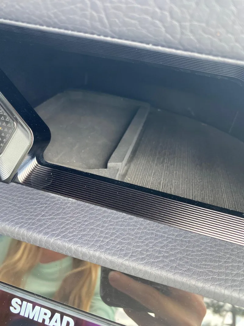 Slide: The Image of Close-up of 2024 Viaggio Diamante 24U dashboard with Simrad display. - 14