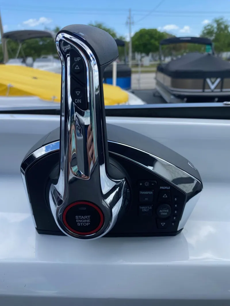 Slide: The Image of 2024 Viaggio Diamante 24U boat throttle control with start/stop button. - 17