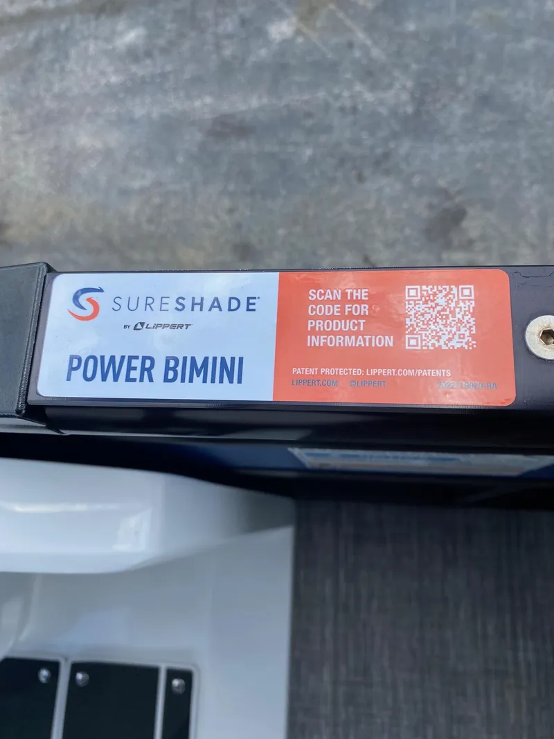 Slide: The Image of SureShade Power Bimini on Viaggio Diamante 24U 2024 model, with QR code for product information. - 18