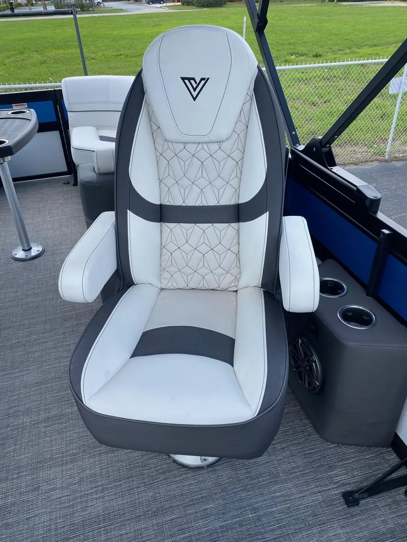 Slide: The Image of Luxurious captain's chair in the 2024 Viaggio Diamante 24U pontoon boat. - 21