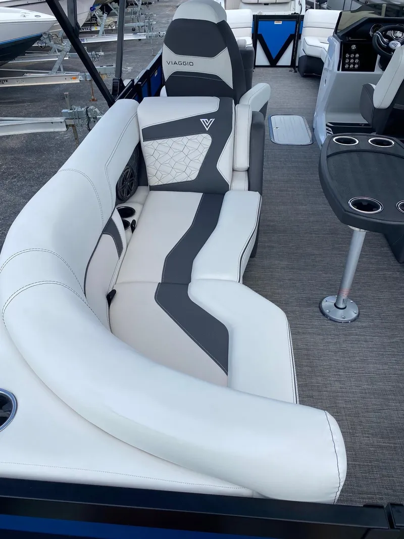 Slide: The Image of 2024 Viaggio Diamante 24U boat interior with white and gray seating. - 25
