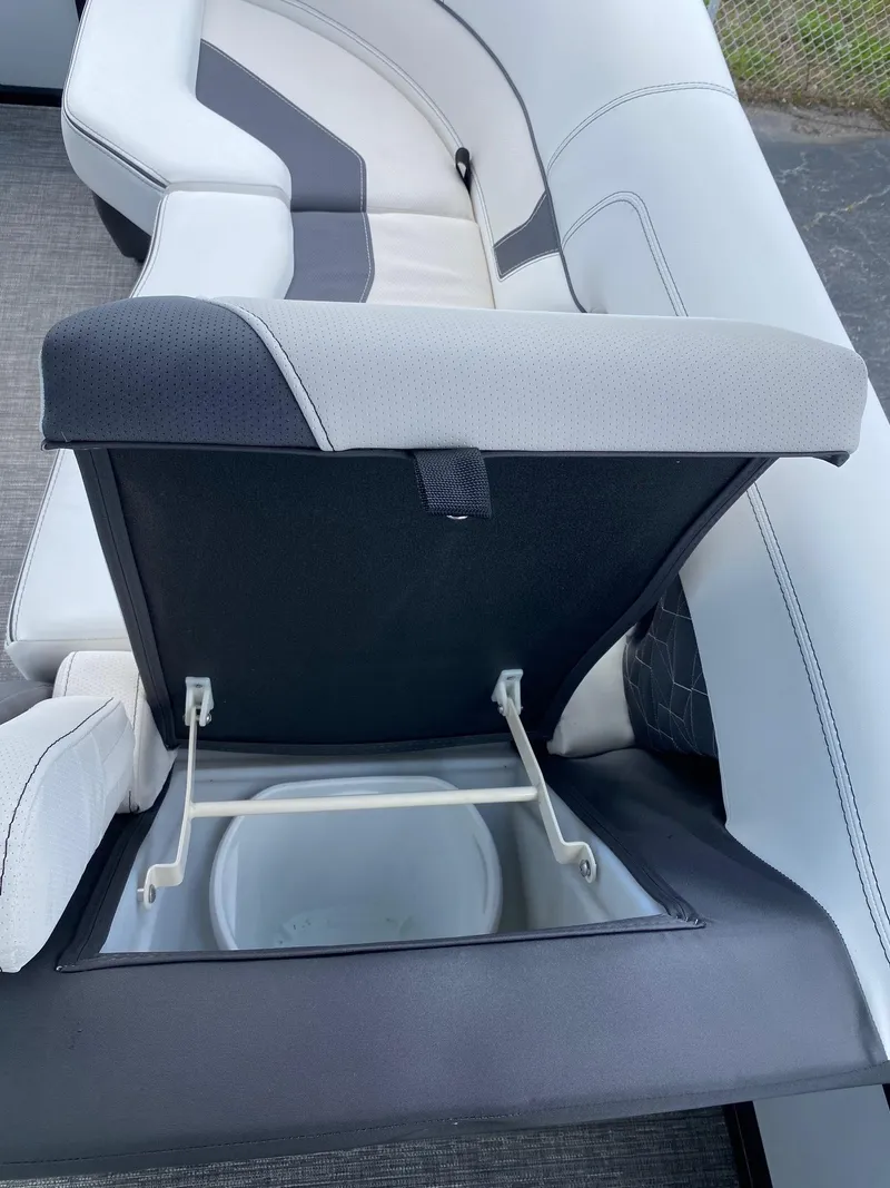 Slide: The Image of Viaggio Diamante 24U 2024 boat with open storage compartment in seating area. - 30