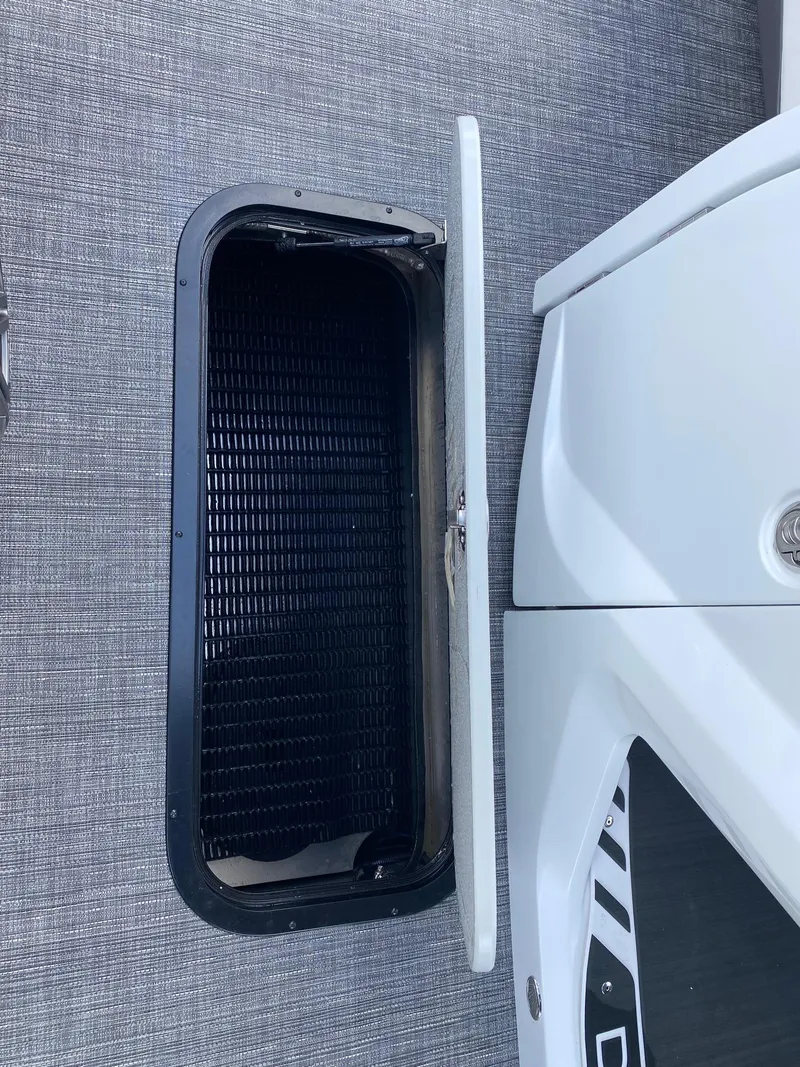 Slide: The Image of Open storage compartment on a 2024 Viaggio Diamante 24U boat. - 36
