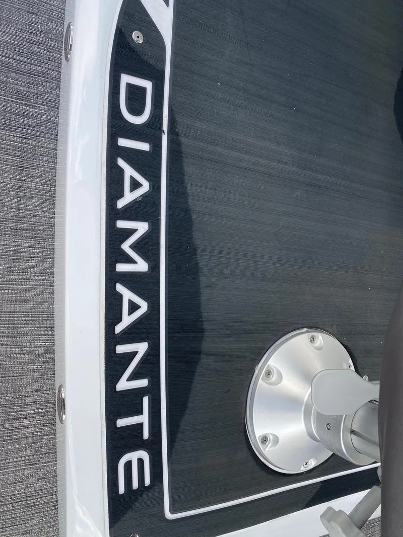 Slide: The Image of 2024 Viaggio Diamante 24U boat deck with Diamante branding. - 37
