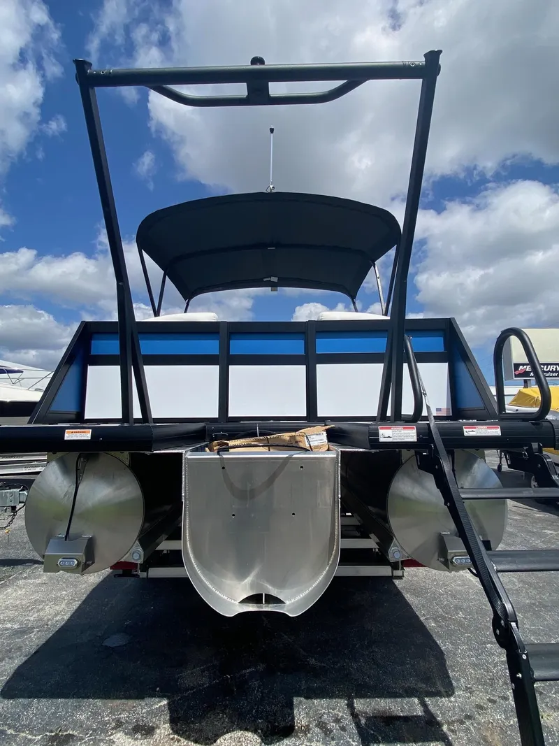 Slide: The Image of 2024 Viaggio Diamante 24U pontoon boat rear view with canopy and dual pontoons. - 4