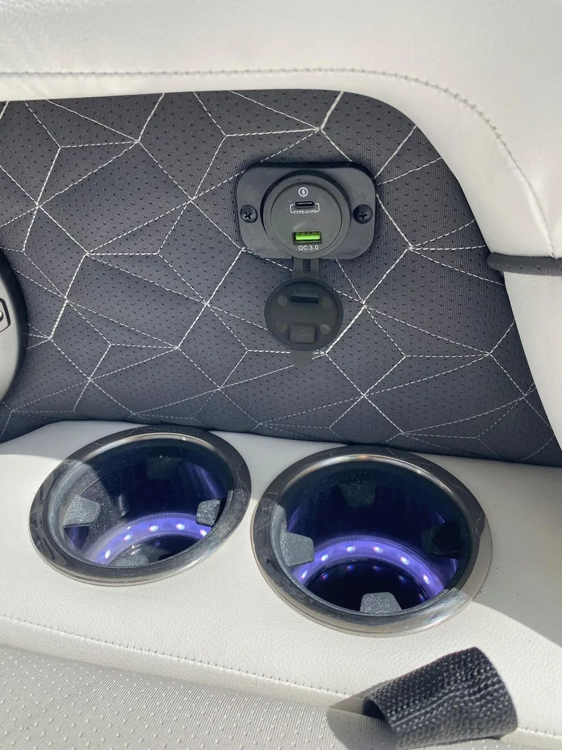 Slide: The Image of 2024 Viaggio Diamante 24U interior with illuminated cup holders and USB charging ports. - 42