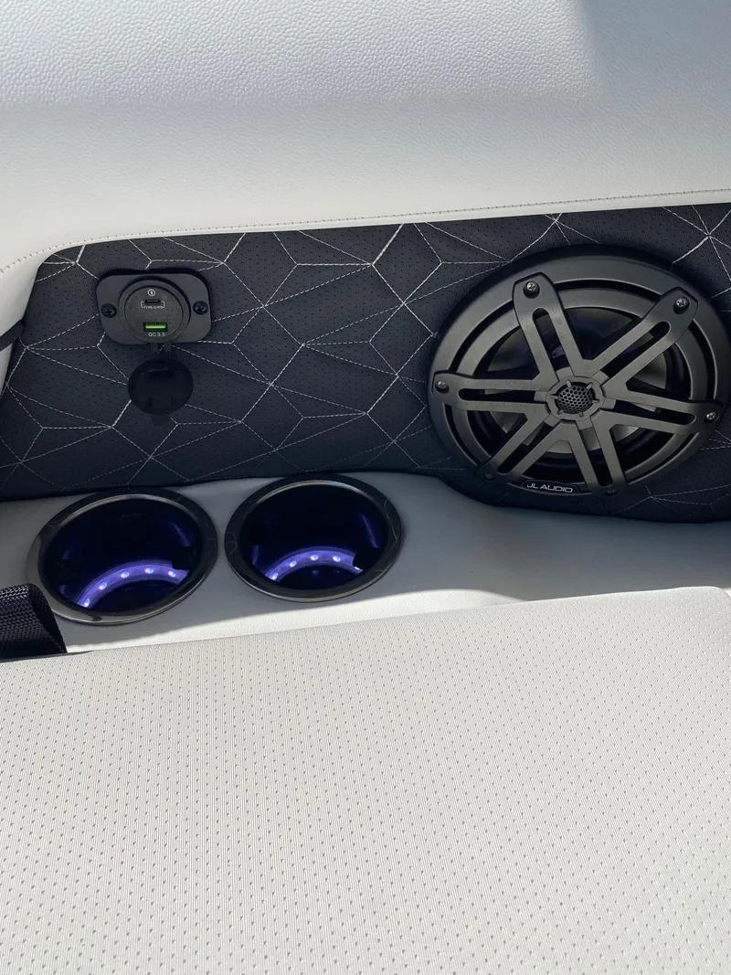 Slide: The Image of 2024 Viaggio Diamante 24U boat interior with speaker and illuminated cup holders. - 43