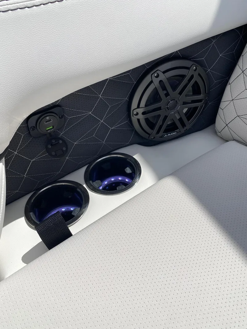 Slide: The Image of 2024 Viaggio Diamante 24U boat interior with speaker and cup holders. - 46