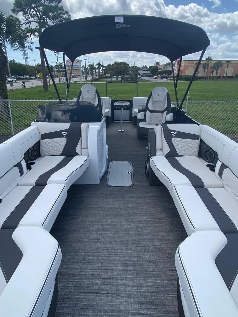 Slide: The Image of 2024 Viaggio Diamante 24U pontoon boat with spacious seating and canopy. - 5