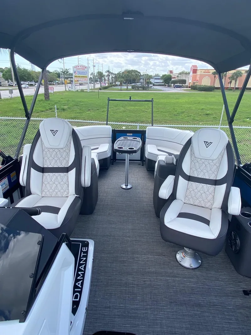 Slide: The Image of 2024 Viaggio Diamante 24U pontoon boat interior with luxurious seating and modern design. - 6