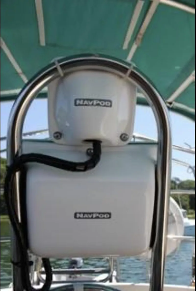Slide: The Image of NavPod equipment on 1990 Island Packet 27 sailboat under green canopy. - 3
