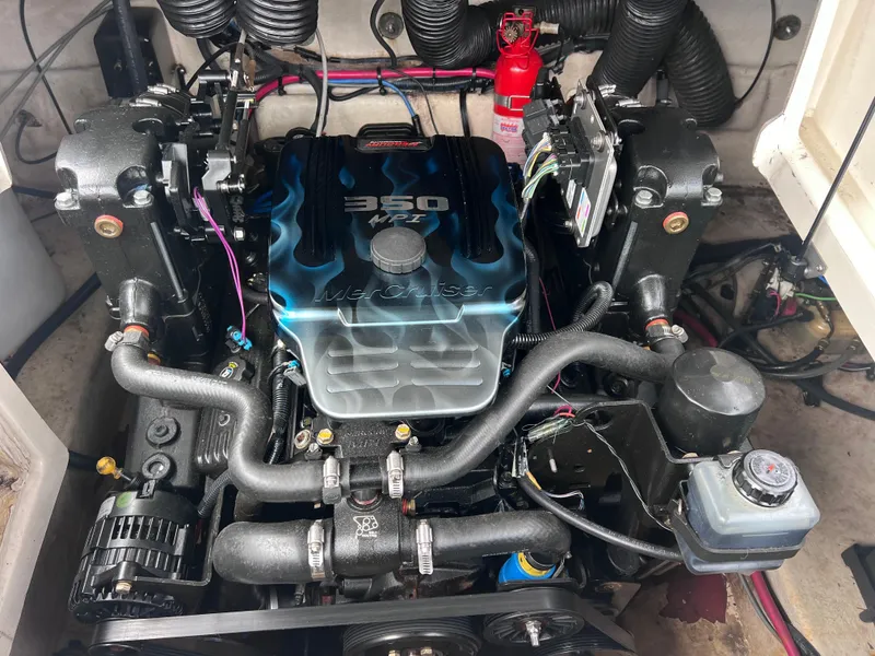 Slide: The Image of Sea Ray 240 Sundeck 2007 engine compartment with 2023 motor, 350 MPI. - 25