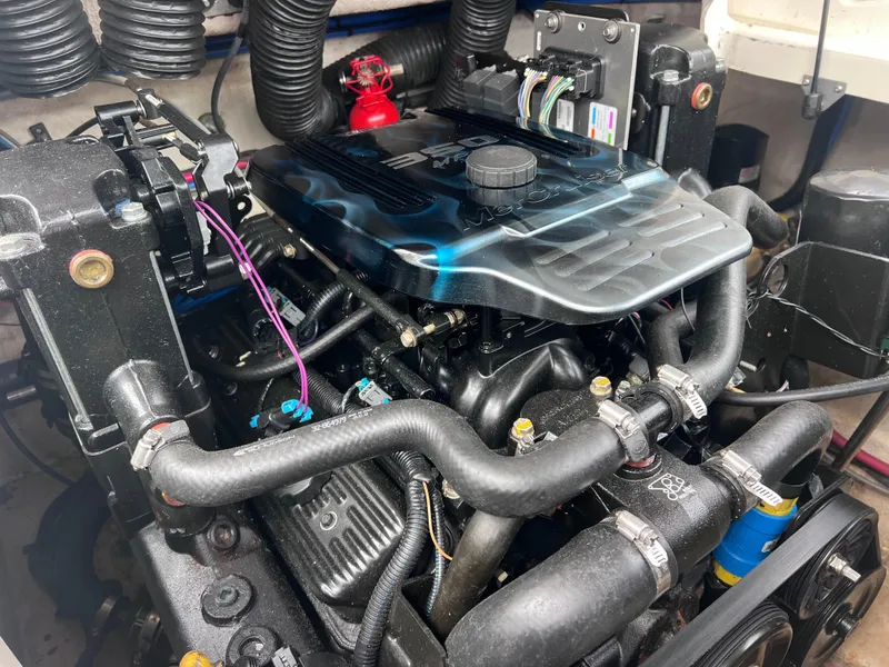 Slide: The Image of Engine of a 2007 Sea Ray 240 Sundeck with 2023 motor. - 26