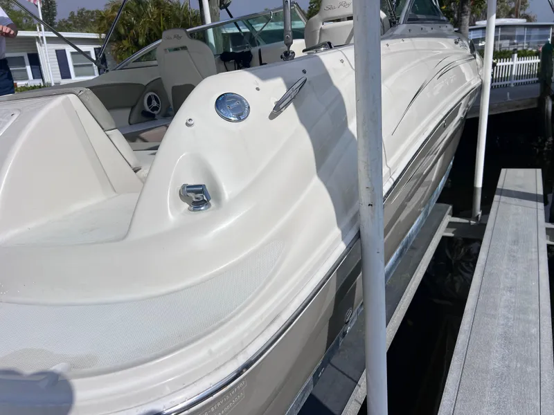 Slide: The Image of 2007 Sea Ray 240 Sundeck with 2023 motor, docked and ready for use. - 33