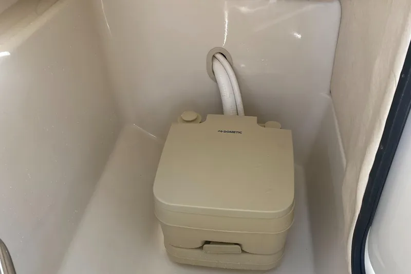 Slide: The Image of Portable toilet in 2007 Sea Ray 240 Sundeck boat with 2023 motor. - 35