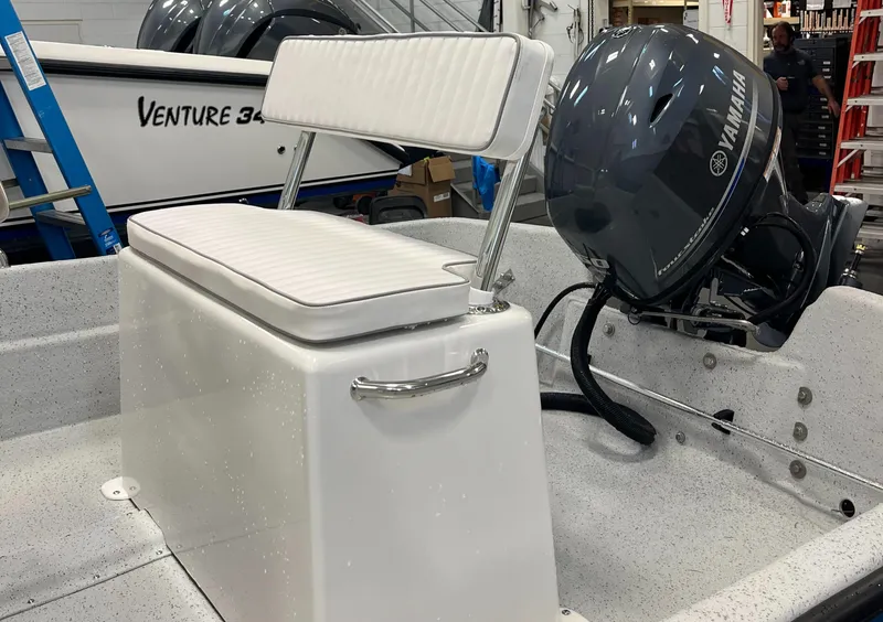 Slide: The Image of 2024 Maritime 1480 Skiff boat interior with Yamaha outboard motor. - 5