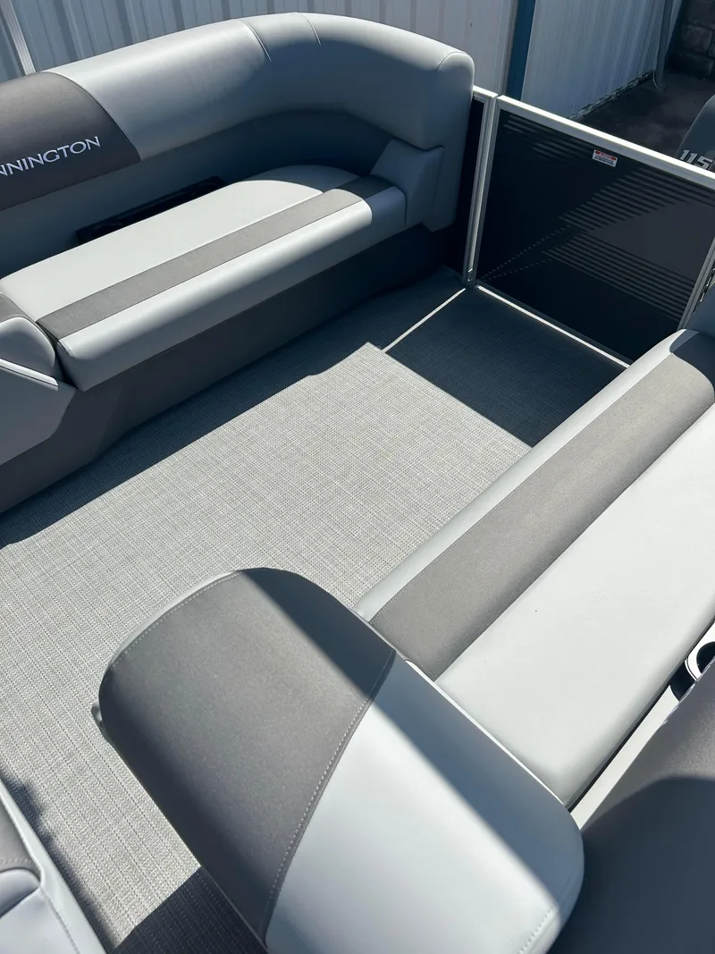 Slide: The Image of 2024 Bennington 22 SVSR pontoon boat interior with gray seating and flooring. - 10