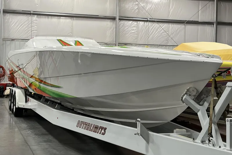 Slide: The Image of 2015 Outerlimits SL-50 powerboat on trailer in indoor storage facility. - 11