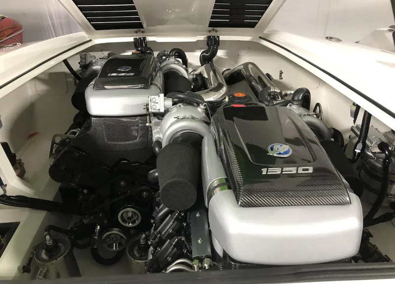 Slide: The Image of 2015 Outerlimits SL-50 engine compartment showcasing powerful twin engines. - 16