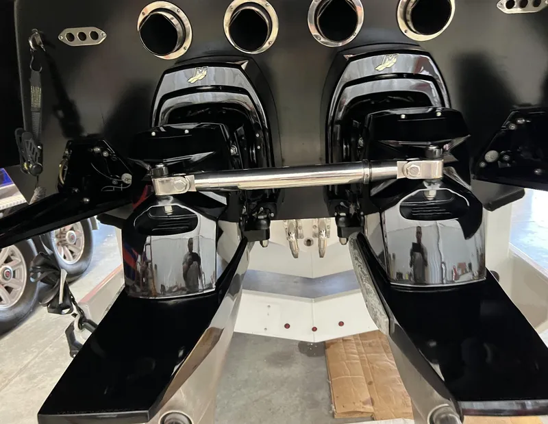 Slide: The Image of 2015 Outerlimits SL-50 boat dual outboard motors and exhaust system. - 18