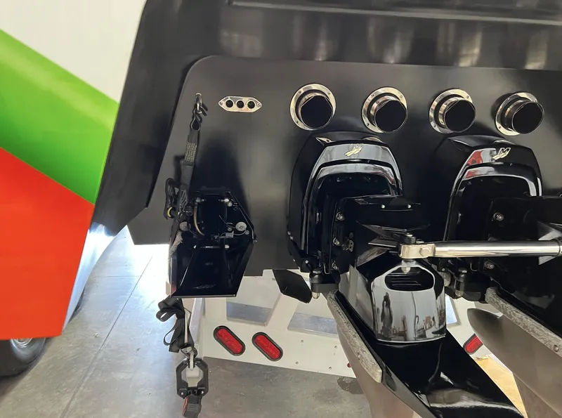 Slide: The Image of 2015 Outerlimits SL-50 boat stern with dual outboard motors. - 19