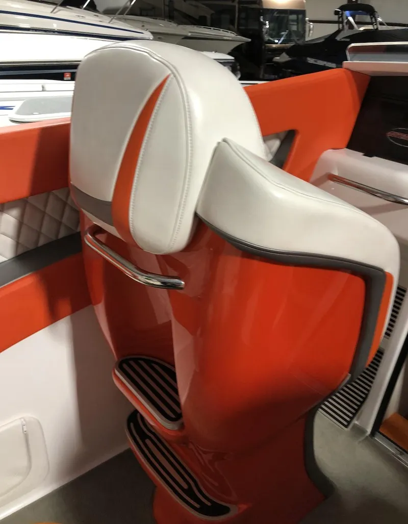 Slide: The Image of 2015 Outerlimits SL-50 boat with orange and white seating. - 25