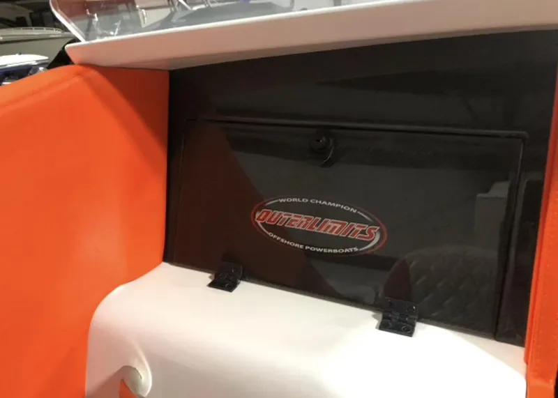 Slide: The Image of 2015 Outerlimits SL-50 powerboat interior with orange and white seating. - 35