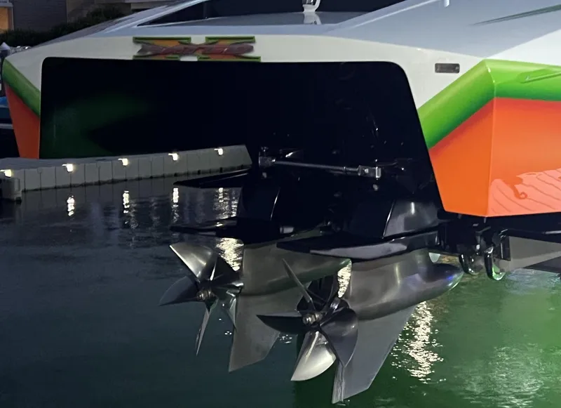 Slide: The Image of 2015 Outerlimits SL-50 boat with dual propellers in water at night. - 5