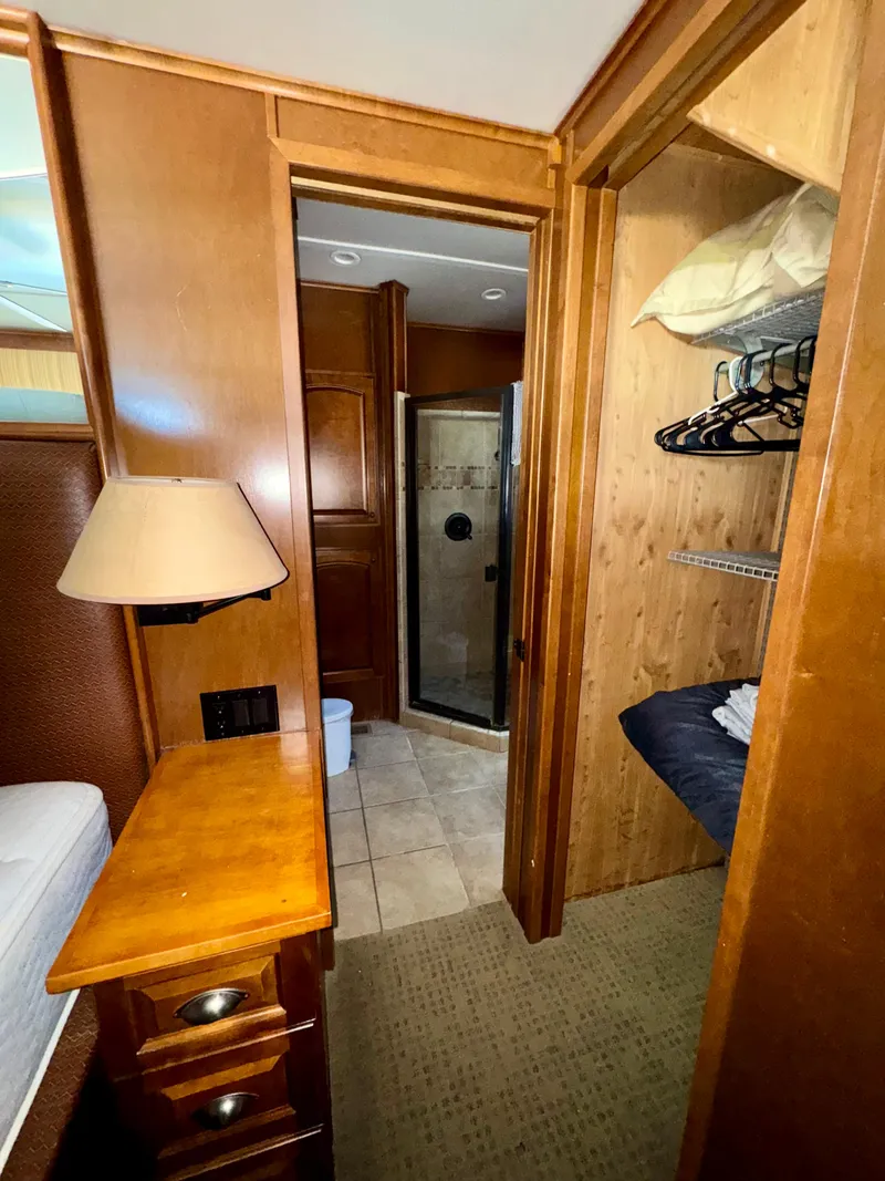 Slide: The Image of Spacious deck of 2011 Bravada Dream Weaver houseboat on serene lake. - 16