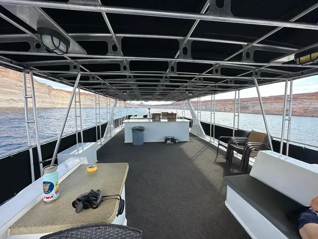 Slide: The Image of Second floor plan of 2011 Bravada Dream Weaver, featuring seating and kitchen layout. - 19