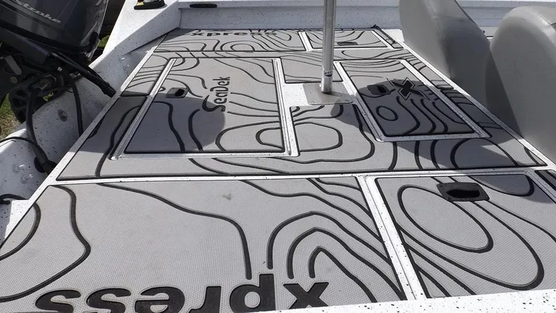 Slide: The Image of 2021 Xpress XP7 boat deck with SeaDek flooring. - 12